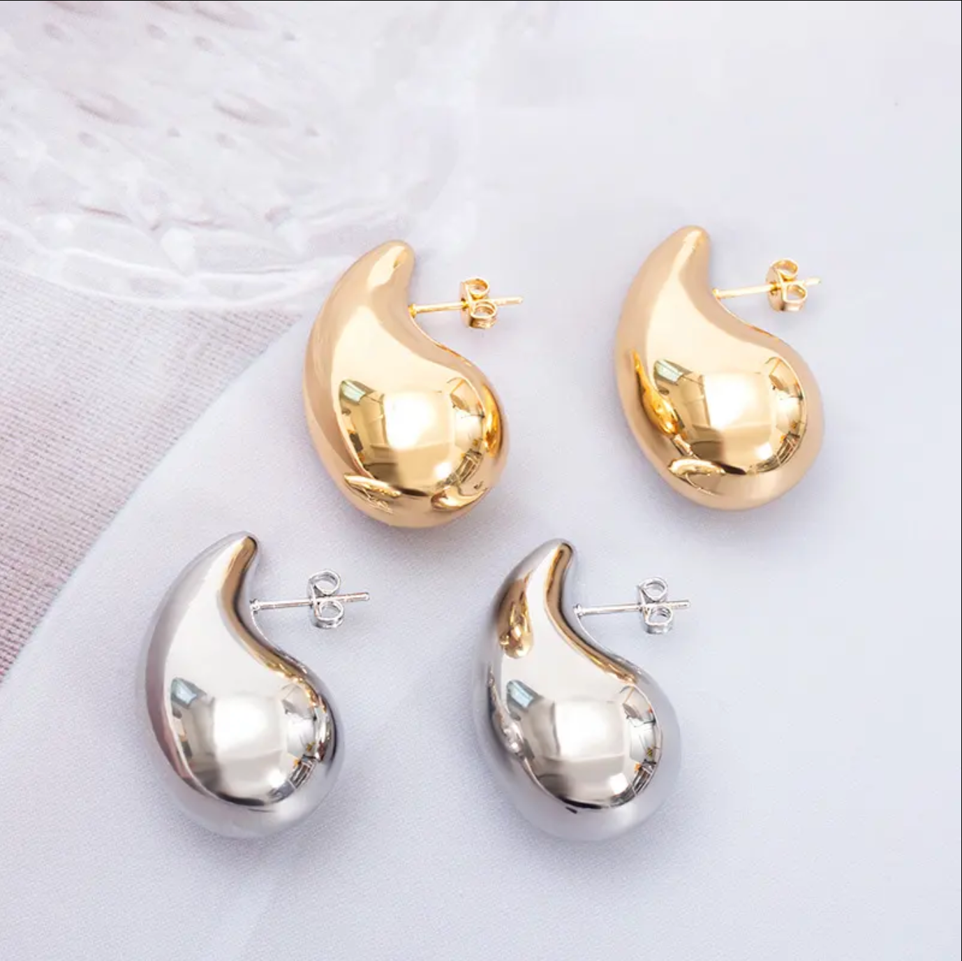 Arete estilo gota AI baño oro 18K