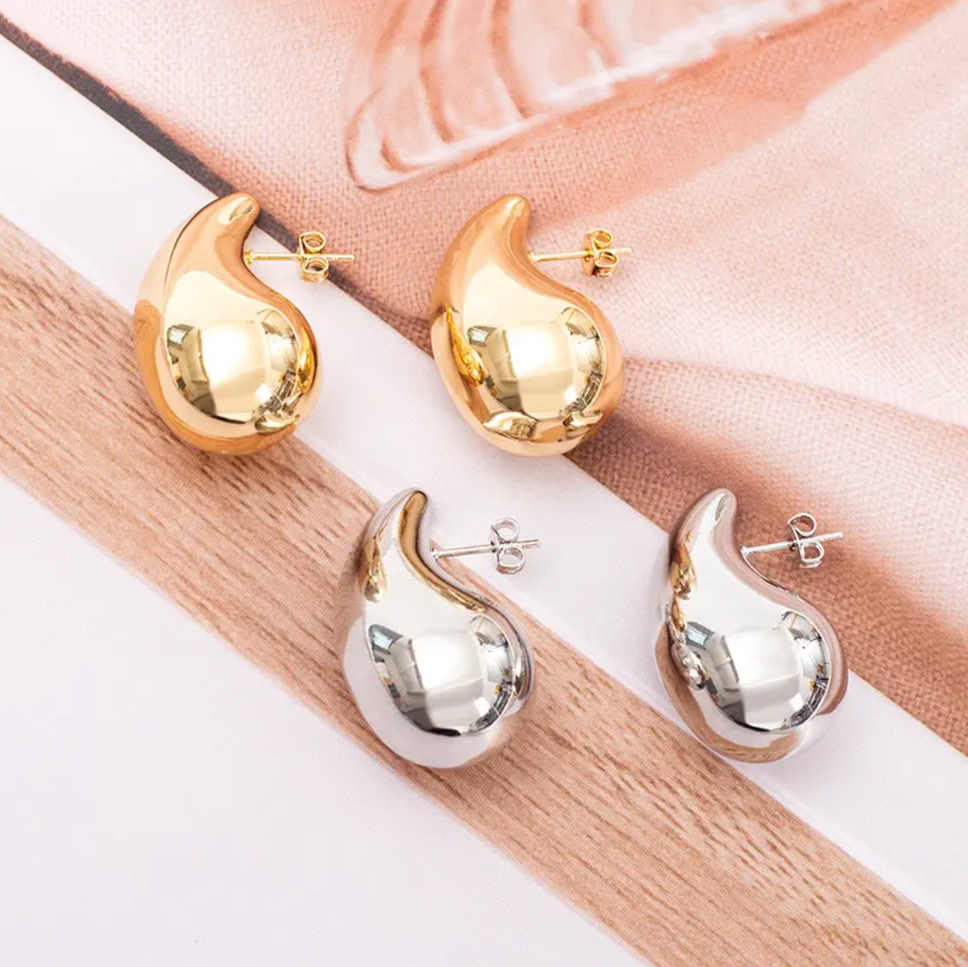 Arete estilo gota AI baño oro 18K